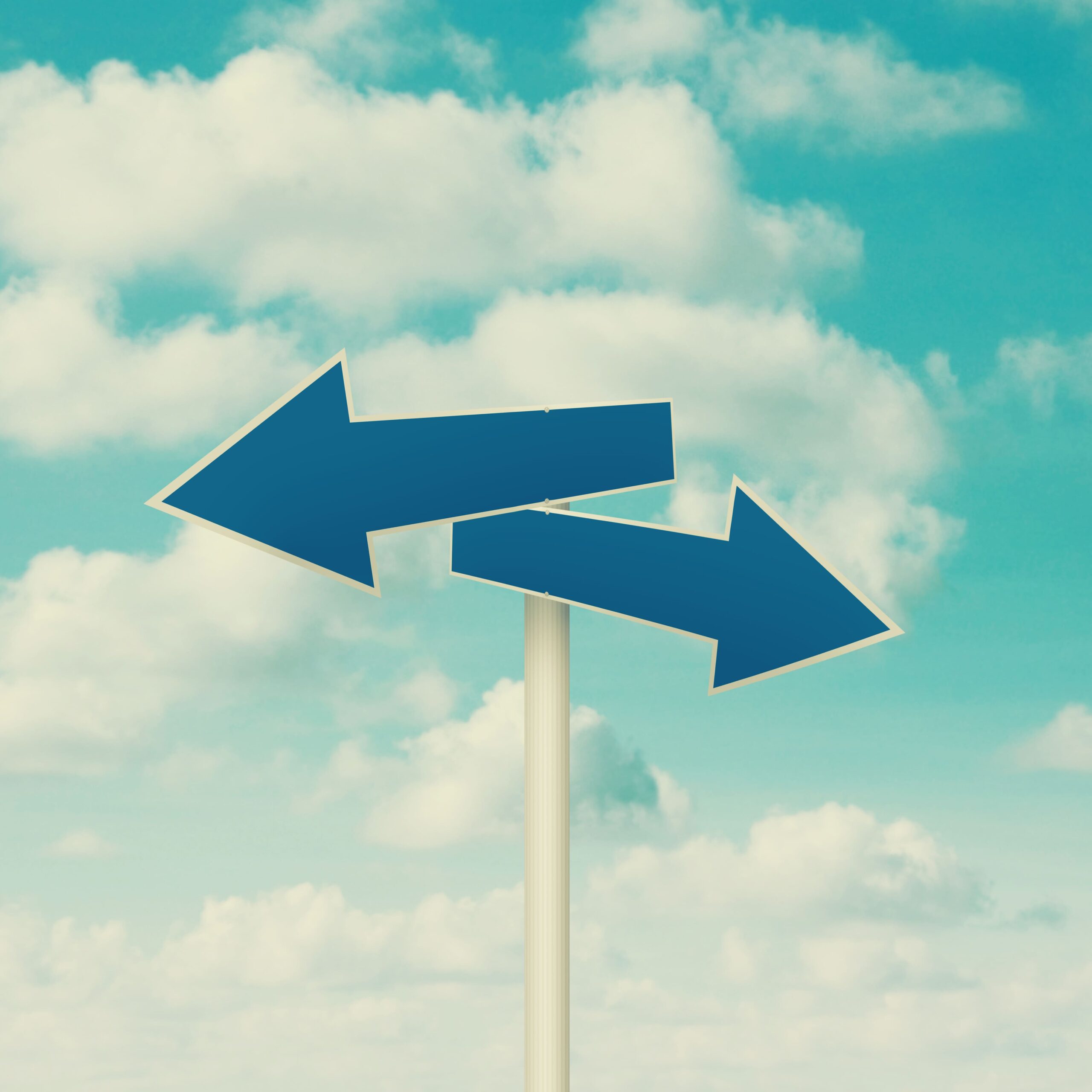 low-angle-view-arrow-symbols-against-sky
